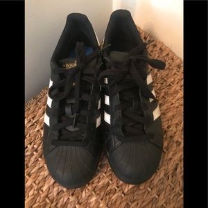 Black with white stripes Classic Adidas Superstars